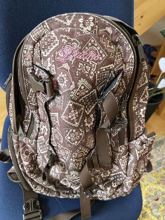 Dakine Rucksack  braun mit pinkem Muster, top