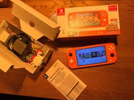 Nintendo Switch Lite Coral sehr gute zustand
