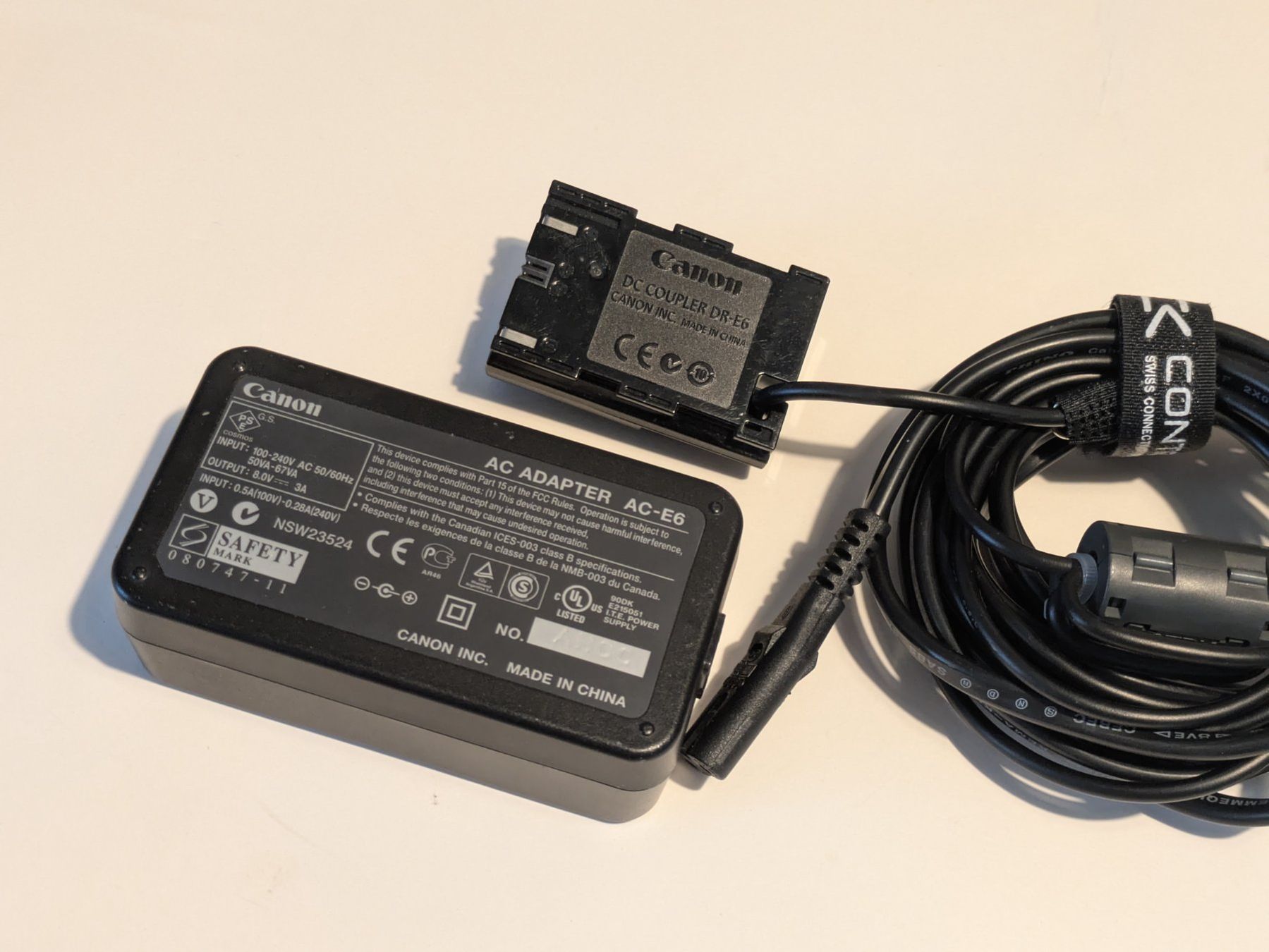 Canon Unità & Adattatore: Canon AC Adapter AC-E6 & DC Coupler DR-E6 Neuwertig – Usato da Birmensdorf ZH venduto da extrachrome 1