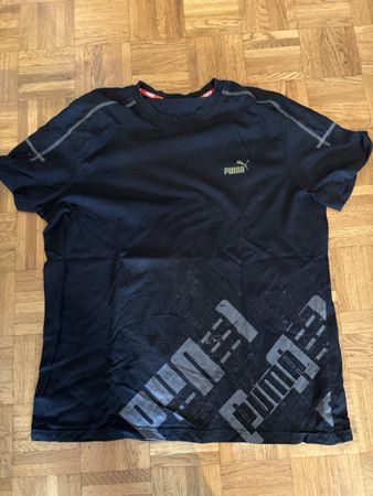 T-shirt Puma noir, taille XL - idéal pour le sport!