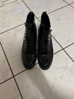 Scarpe a stivaletto di pelle lucida 