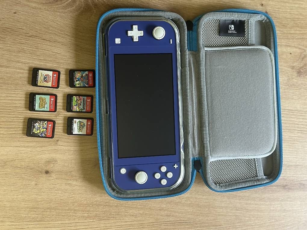 Consoles: Nintendo Switch Lite + 6 Spiele + Tasche – D'occasion à Luzern par Wilson019 3
