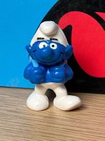 Schlumpf mit blauem Rucksack