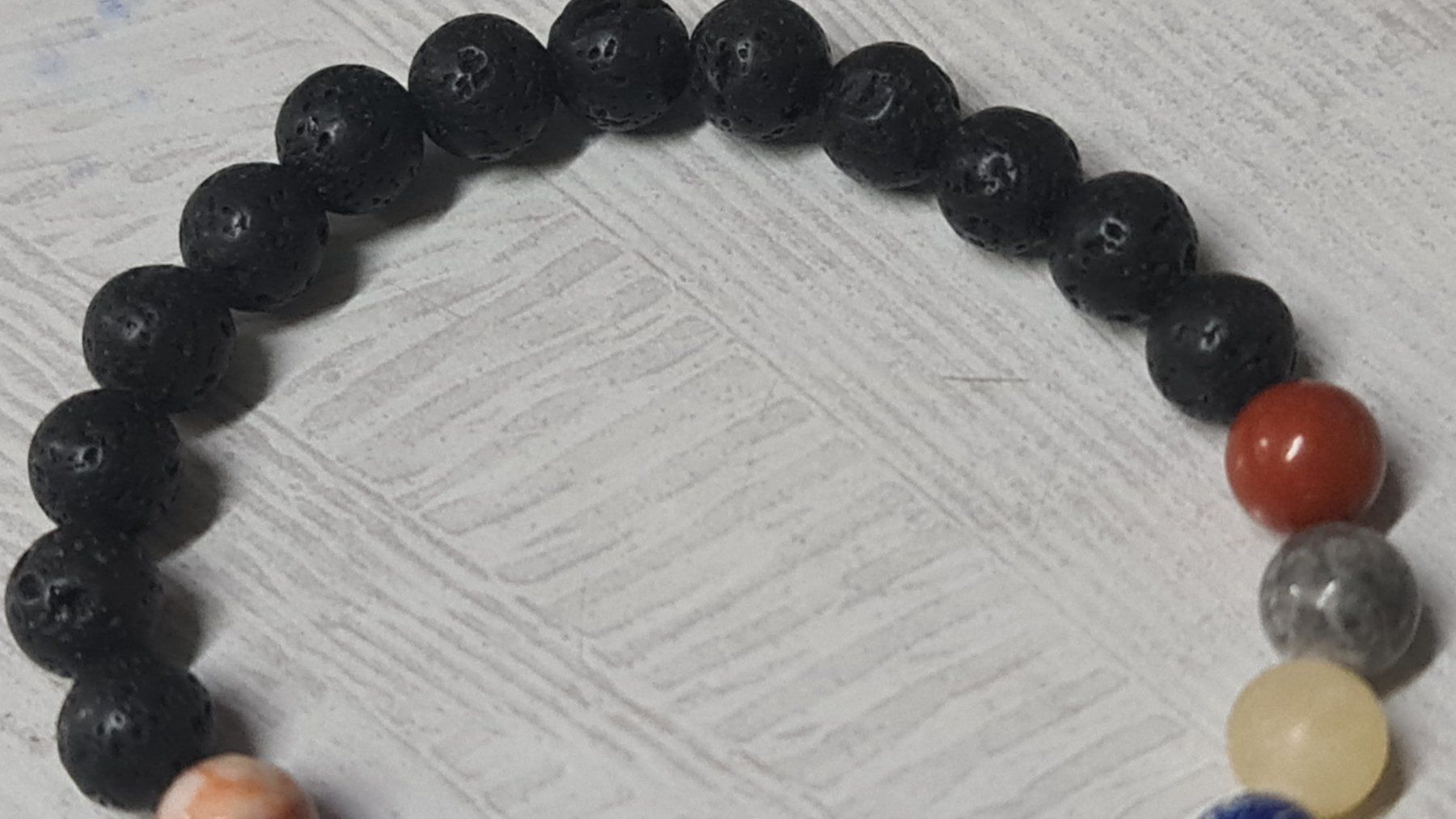 Bracciali & Braccialetti: Solar System Planeten Armband aus Stein – Nuovo e nell'imballaggio originale da Uerkheim venduto da Kaufoption 4