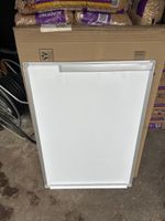 Tableau blanc sur trépied