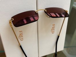 Lunettes de soleil Fred sans cadre doré verres marron