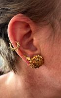 Boucles d'oreilles et pendentif soleil, or 18 cts - 8.23 gr