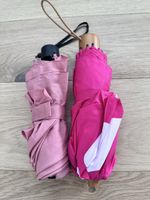 Zwei Knirps/ Schirme