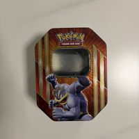 Pokémon Machomei Tin leer