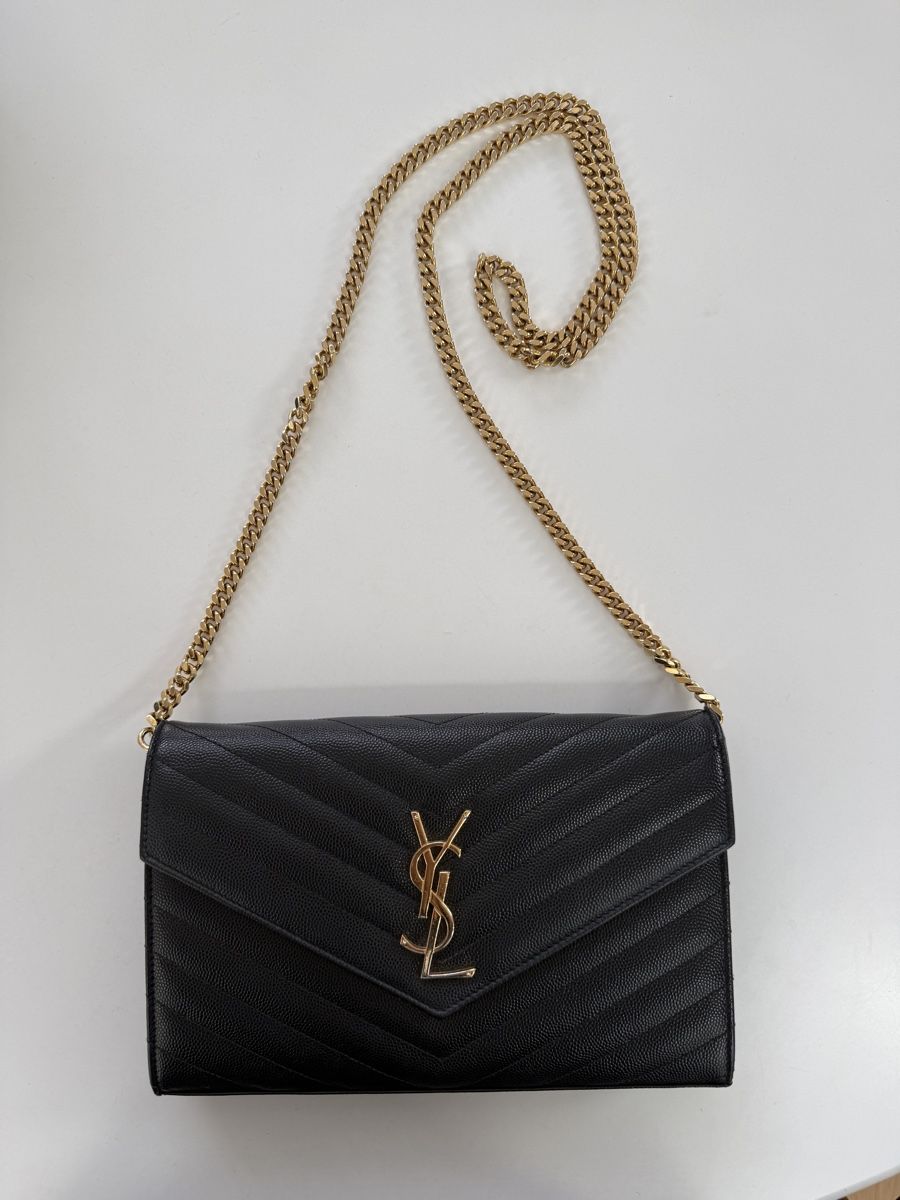 Saint Laurent Sacs femmes: Saint Laurent Tasche Schwarz mit Gold – D'occasion à Zürich par vintagewiedikon