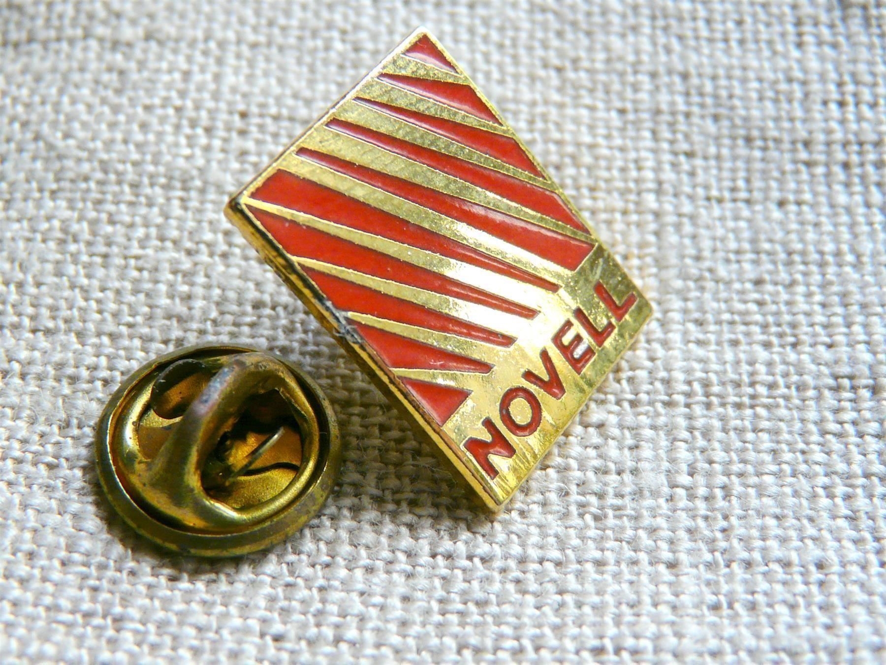 Placchette & Badge: • Novell software rot IT Informatik vintage      Pin M5.13 – Usato da Pully venduto da websurfer1