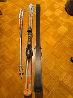 Atomic Ski mit Bindung und Stöcken