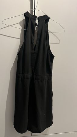 Elegant Black Romper with Cutout Detail