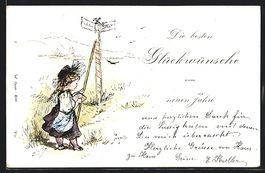 Kleine Schweizerin in Tracht am Wegweise