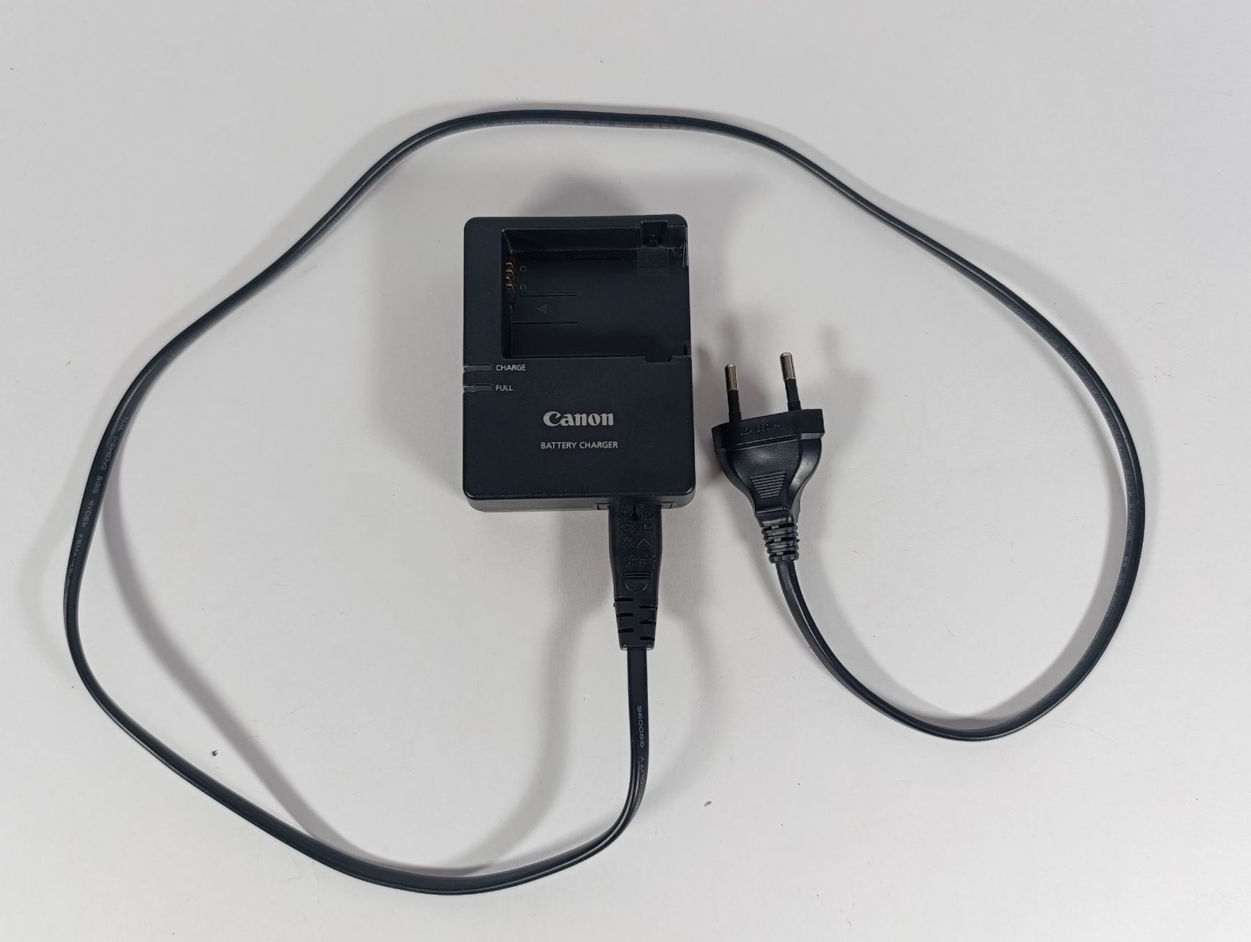 Canon Altri Accessori: CANON Chargeur de batterie LC-E8 – Usato da Thielle venduto da Plusvalue_Neuchatel