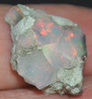 Edelstein L-9790–Schwarzer Äthiopischer Opal roh 11.85 Karat