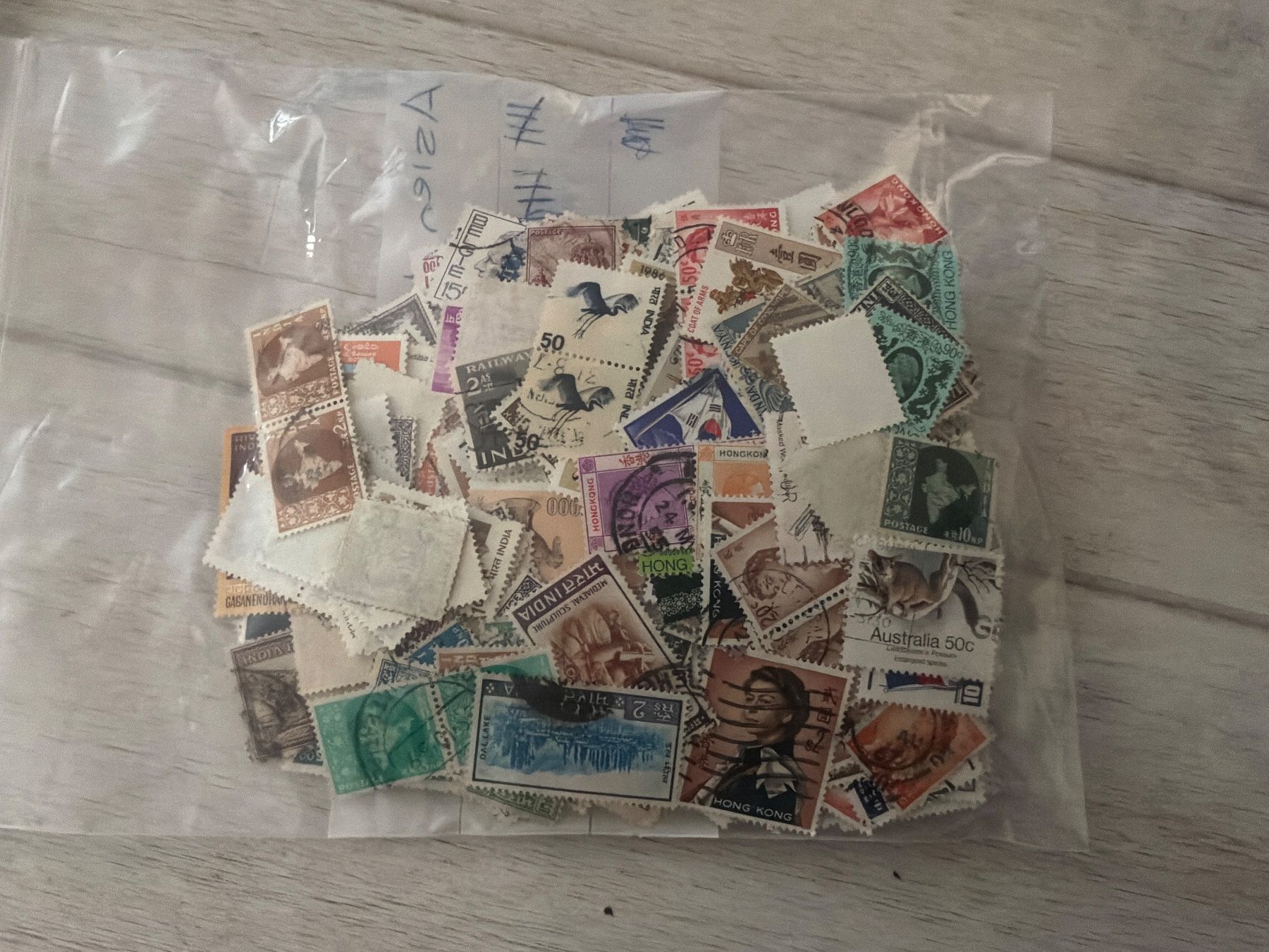 Alle Briefmarken: 1000 Briefmarken Asien (3-3) – Gebraucht aus St. Gallen von Setin