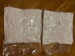 2 coussins NEUFS taille 60cm x 60cm NEUFS