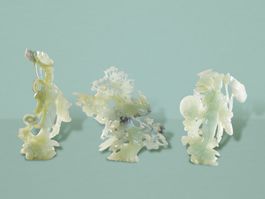 DREI KUNSTVOLLE JADEFIGUREN AUS JADEIT