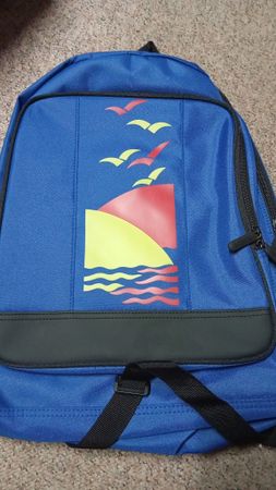 Neuer Rucksack blau mit Sonnenuntergang Motiv