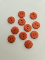 11 Knöpfe orange
