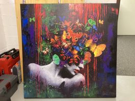Leinwandbild Frau mit Schmetterlingen 100x100cm