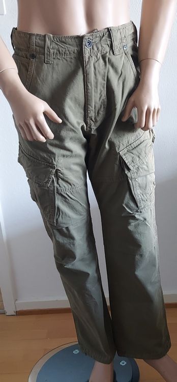 Pantaloni: Neue Wrangler Cargohose, Khaki Grün Grösse W30 L34 – Nuovo e nell'imballaggio originale da Basel venduto da Mazzo84
