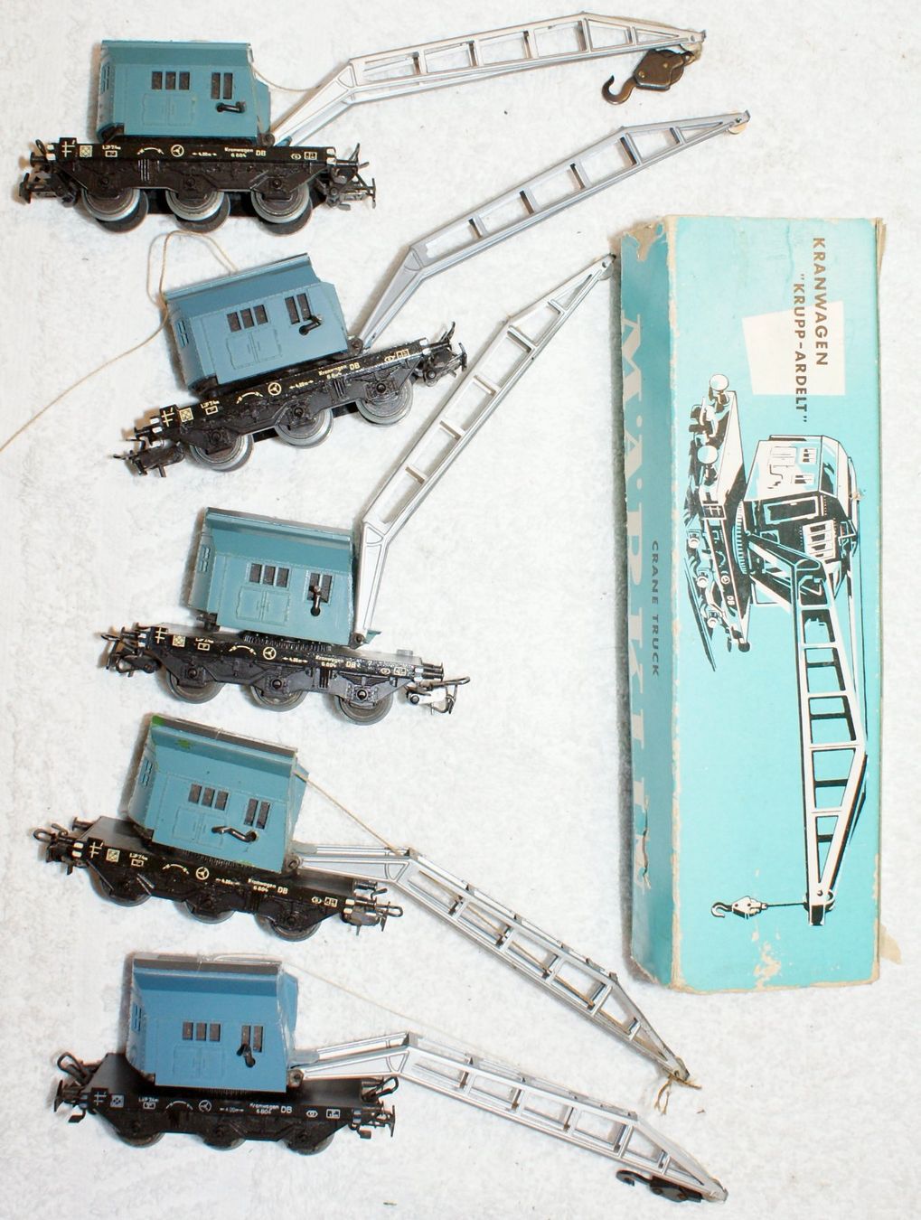 Märklin Modellini di ferrovie: Lot de 5 wagons grues Marklin – Usato da Morrens VD venduto da alain50