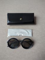 Sonnenbrille mit von Hand verdunkelbaren Gläser