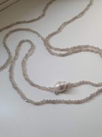 Collana lunga con pietre preziose