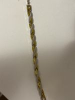 Bracelet doré et argenté, maille originale, état d'occasion