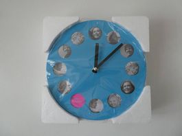 Neue Wanduhr mit eigenen Fotos gestalten