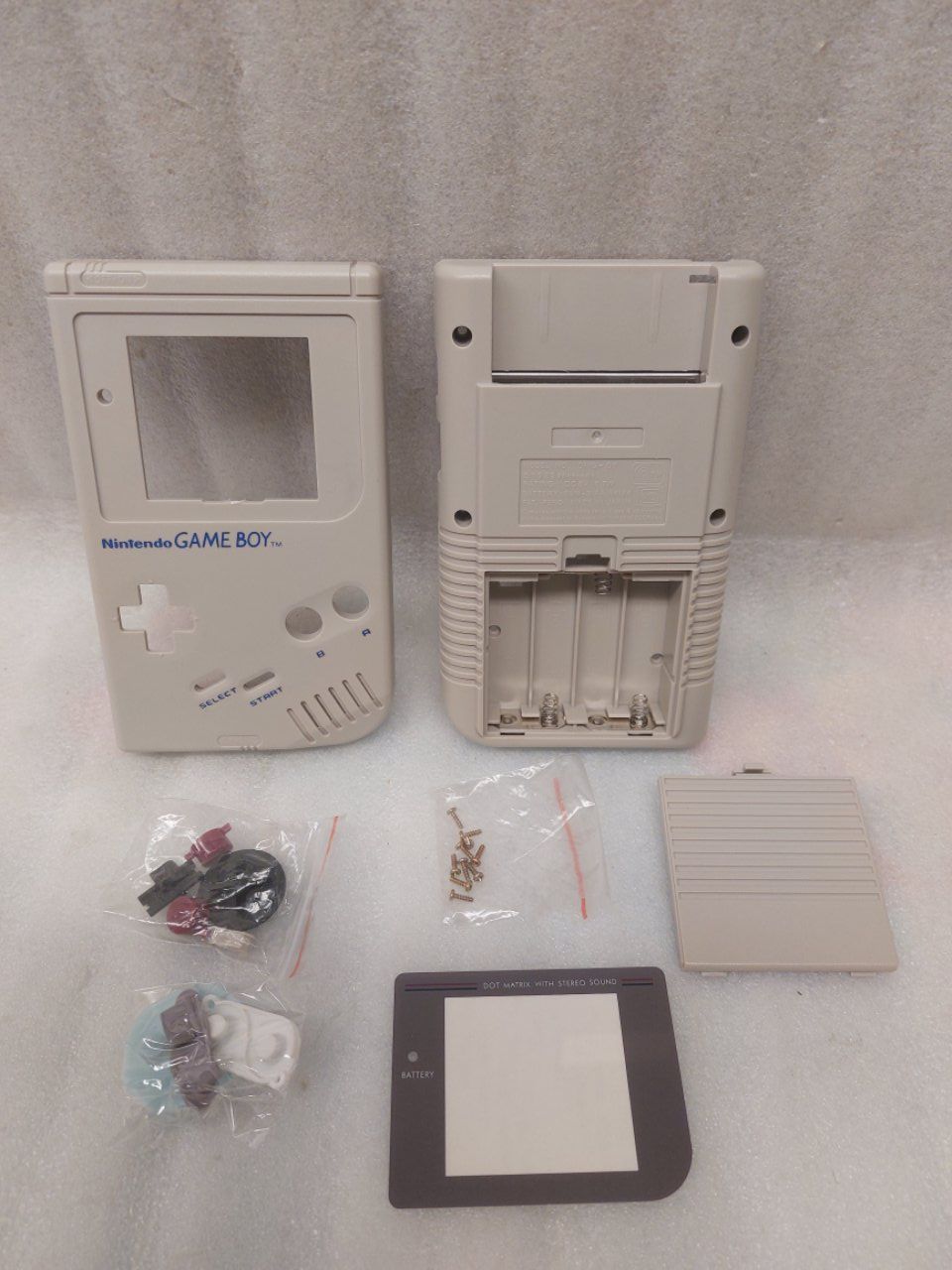 Coques & Protection écran: Grey cover/case for Game Boy – Neuf avec emballage d'origine à Pambio Noranco par Pol69