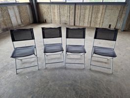 4 klappbare Gartenstühle