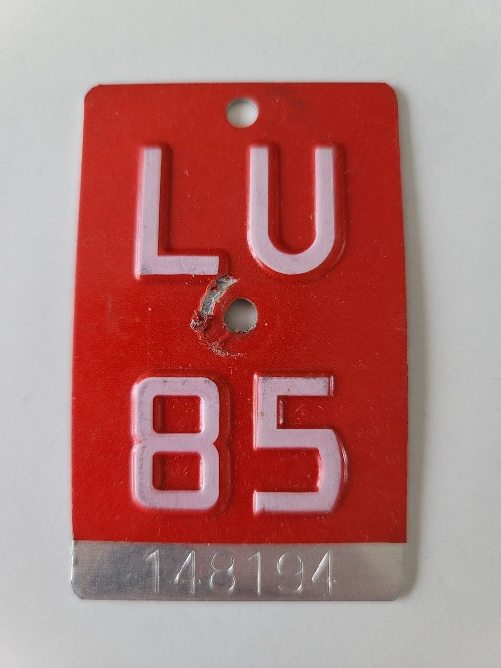 Insegne: Velonummer LU 85 – Usato da Eschenbach LU venduto da Pasaruwa