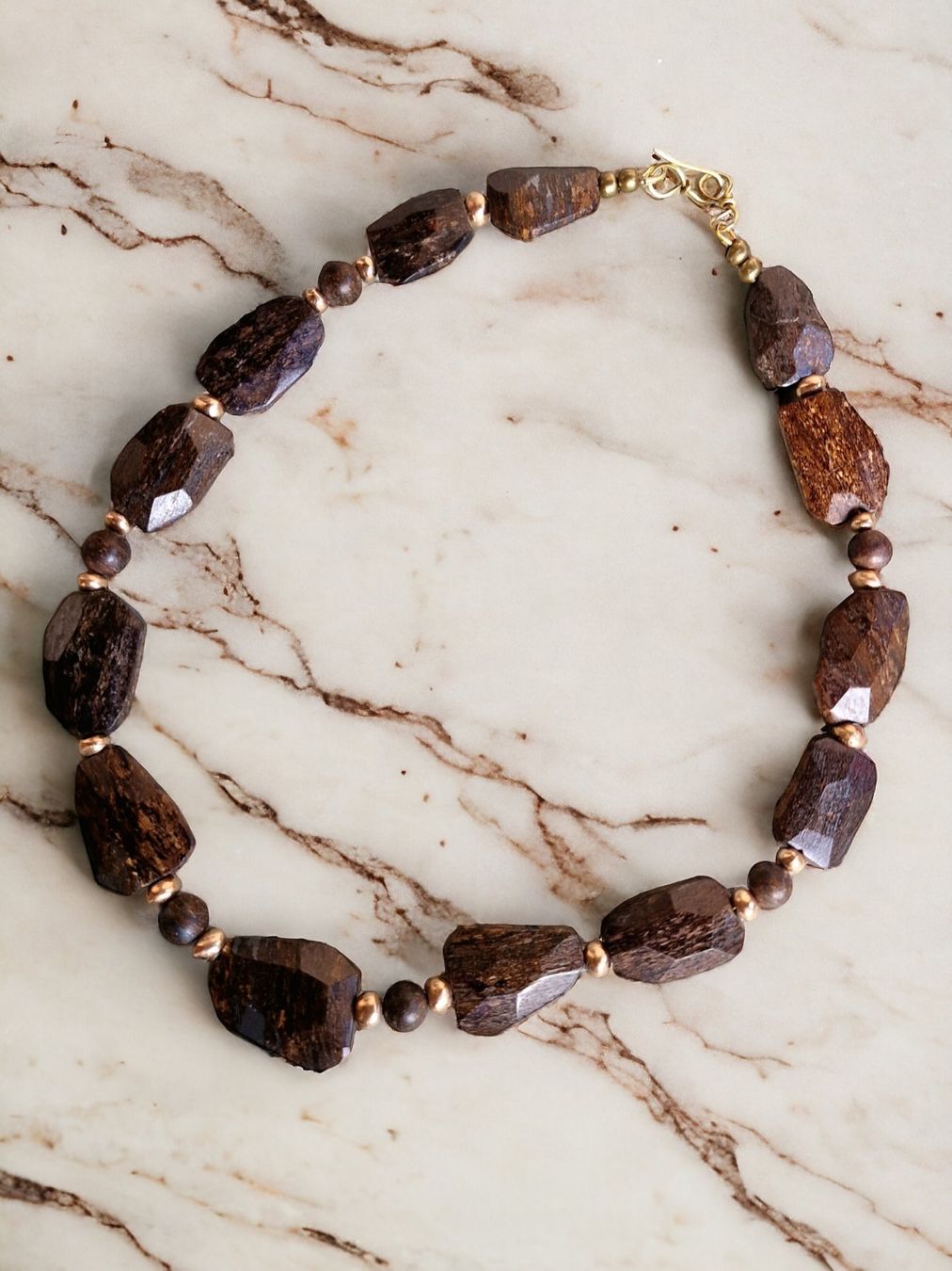 Catenine: Statement-Collier Bronzit mit Bronze-Perlen – Nuovo e nell'imballaggio originale da Aarau venduto da Schmuckhoehle_MD 6