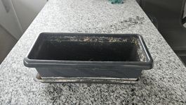 Schwarzer Blumenkasten gebraucht