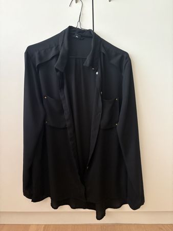 Chic black long-sleeve shirt, size EUR 40/US 10, perfect for