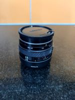 Objectif Minolta AF 35-70mm f/4 Macro (Monture A) + Bouchons