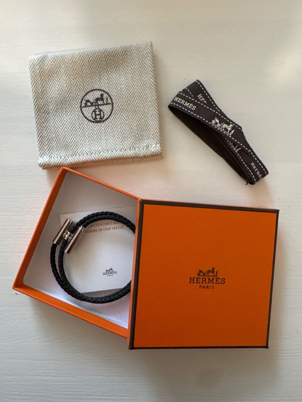 Hermès Bracciali & Braccialetti: Hermès Armband Tournis Tressé – Usato da Basel venduto da asmanobe