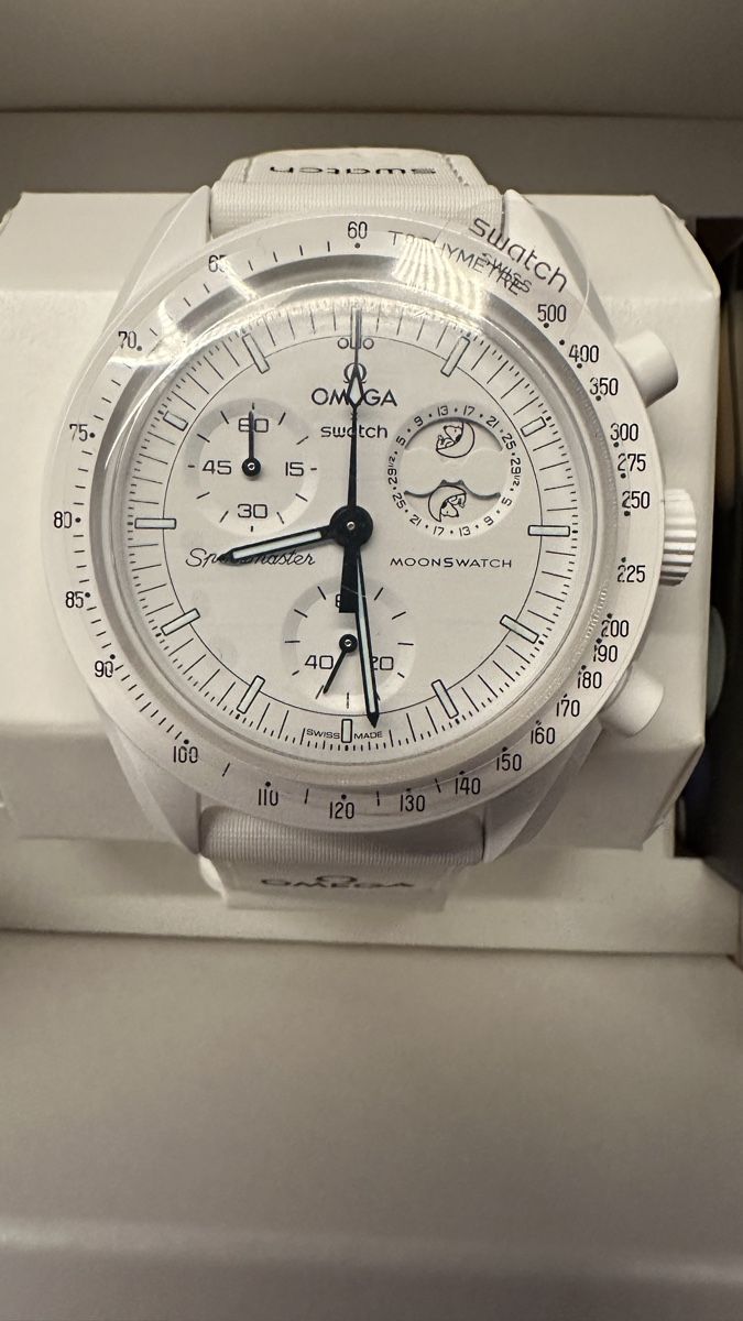 Swatch Orologi: Swatch Moonswatch Snoopy – Nuovo e nell'imballaggio originale da Illnau venduto da Harley670