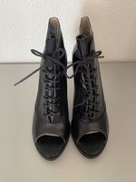 Bottines Bronx à talons hauts et lacets, cuir noir 38