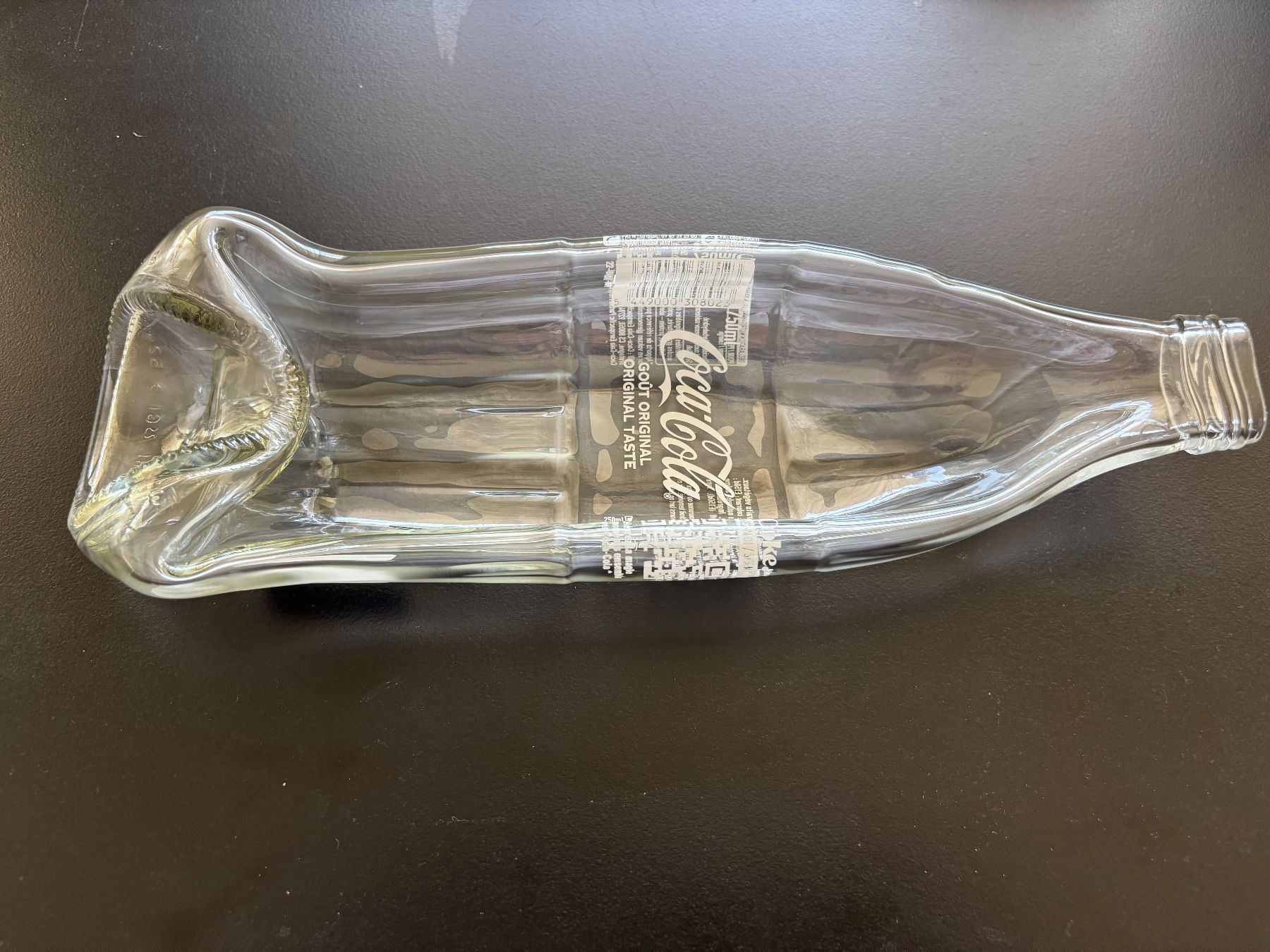 Coca-Cola Altro in Stoviglie & Bicchieri: Cola Flasche 27cm geschmolzen, Kunst, Ablage usw.. – Nuovo (secondo la descrizione) da Zürich venduto da Peter_Schmitt