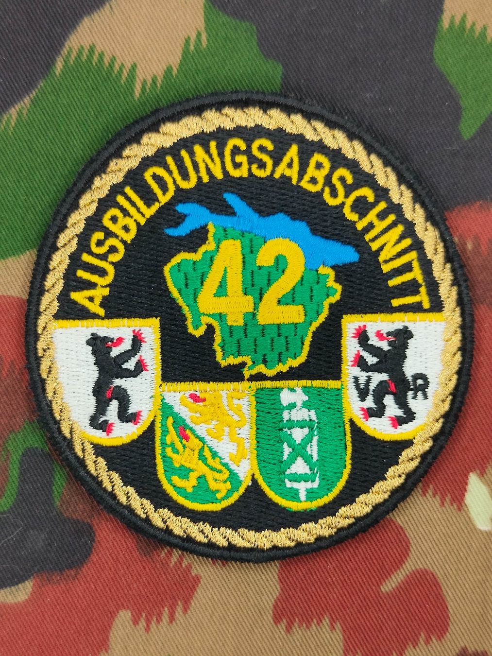 Schweizer Armee Placchette & Badge: Verbandsabzeichen Ausbildungsabschnitt 42 – Usato da Bauma venduto da SwissMilitaria