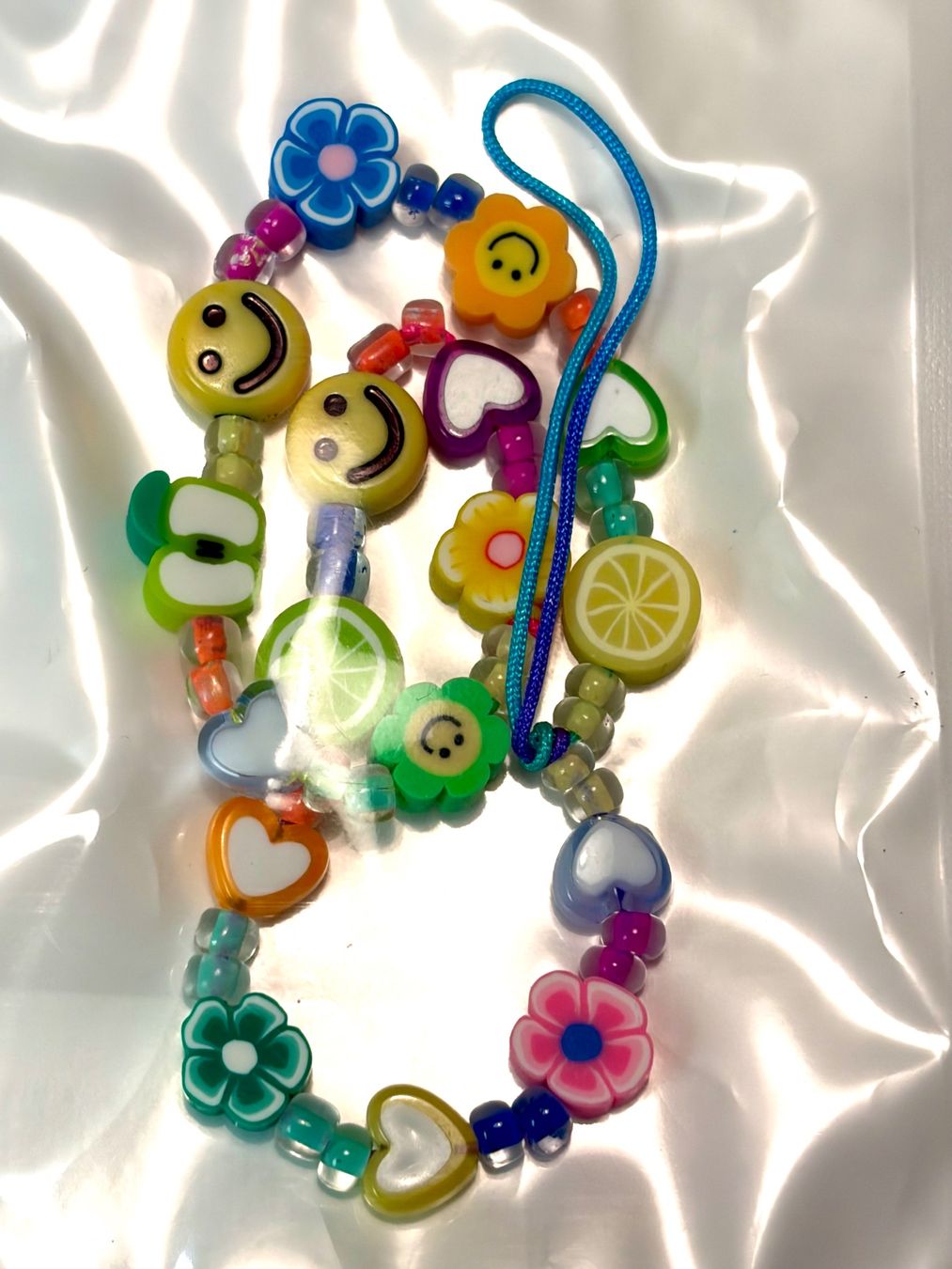 Pendentifs: PhoneLook Universal Smartphone Armband Schmuck Charms Blume – Neuf avec emballage d'origine à Erlenbach ZH par Ritschly 2