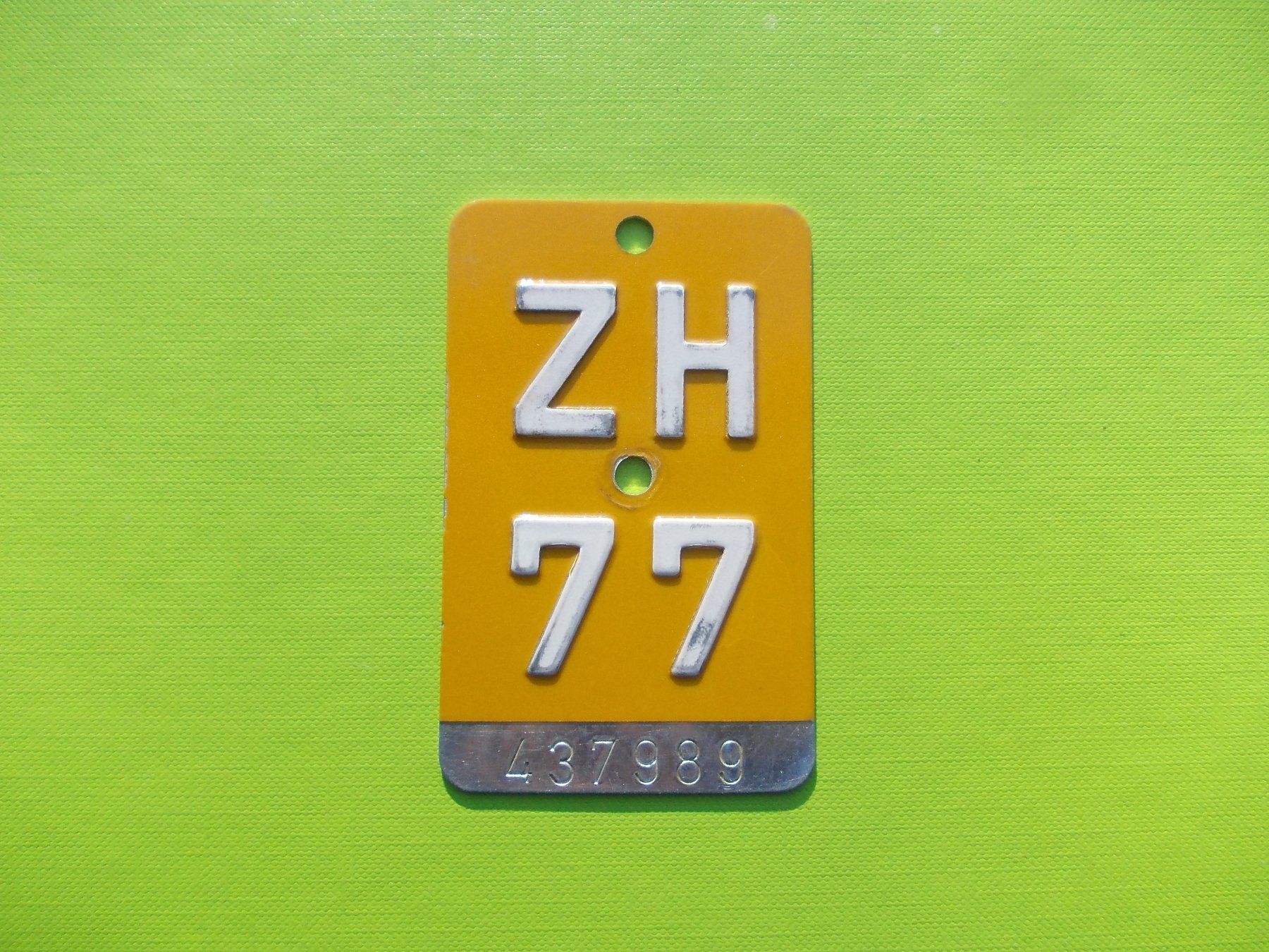Insegne: Velonummer / Mofanummer / Töfflinummer ZH 77 – Usato da Gsteigwiler venduto da HORMIGA21