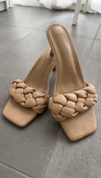 Beige heeled mules