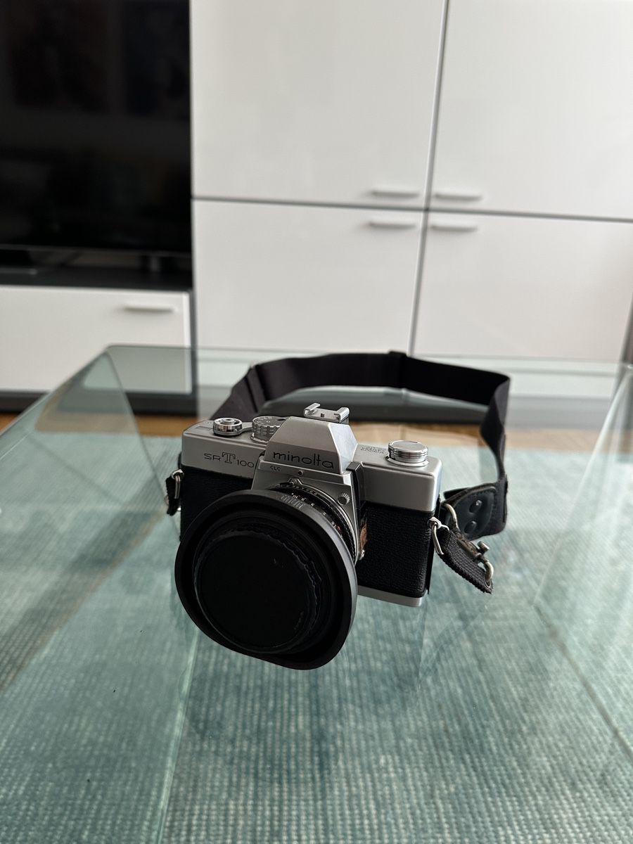 Minolta Fotocamera: Minolta SR-T 100 mit Objektiv & Tasche – Usato da Oberengstringen venduto da sasej 1