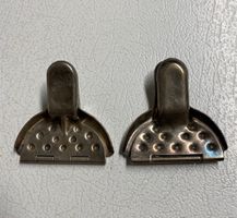 Antica coppia di spremilimoni argentata (2 pezzi)