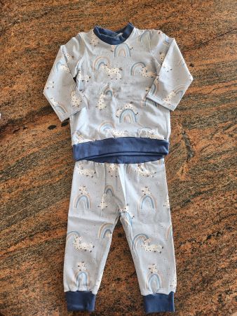 Baby Pyjama hellblau Gr. 74 mit Regenbogen/Zebra Motiv, neu